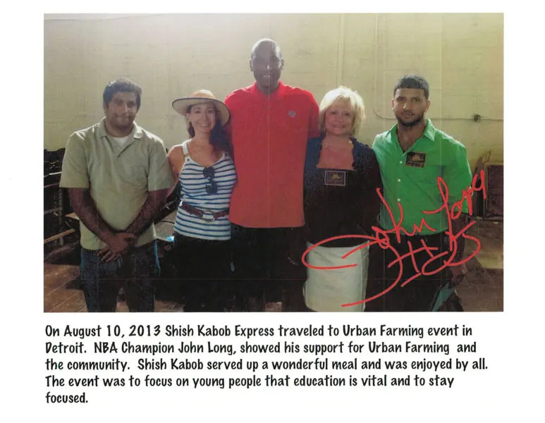 Serving the community at the 2013 Urban Farming event in Detroit