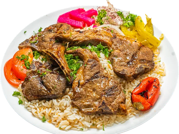 Grilled lamb chops over rice