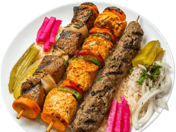 Shish kabob platter with chicken, meat and kafta skewers